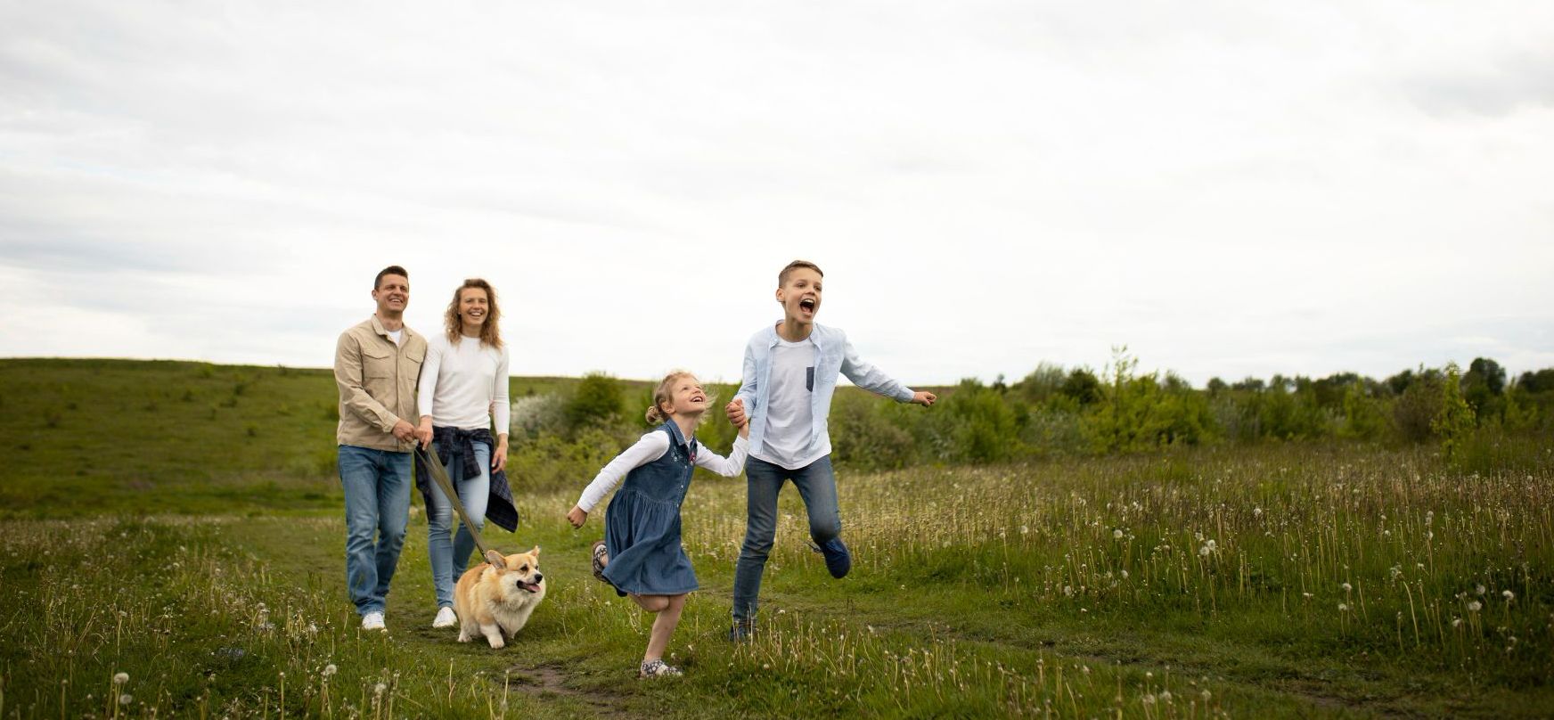 Happy Family Field Running Laughing